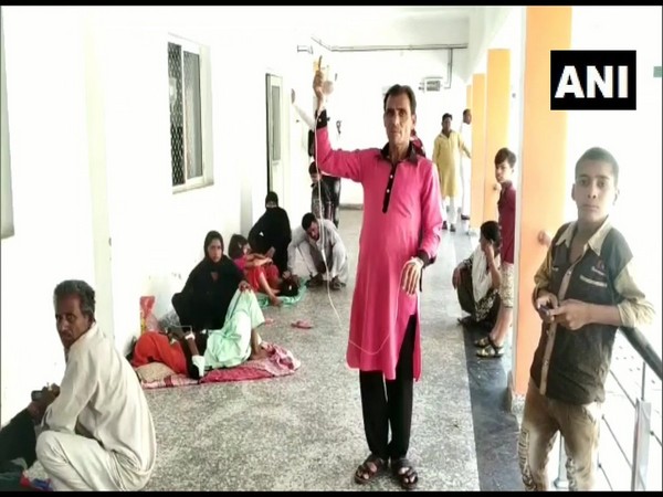 atients being treated on the floor at Rampur District Hospital.