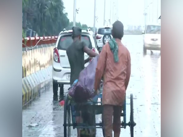 People carrying dead body on a cart. (Photo/ANI)