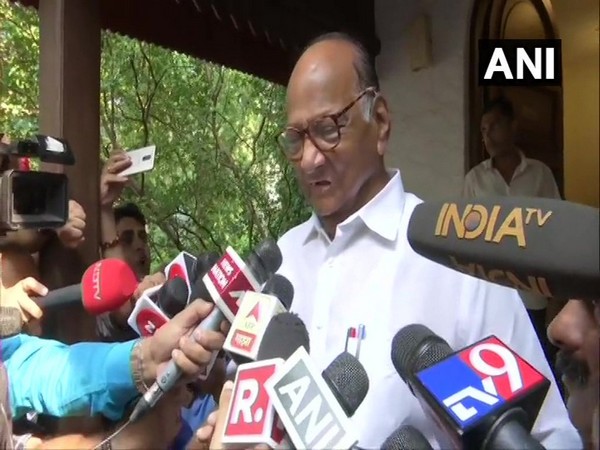 NCP chief Sharad Pawar speaking to reporters in Mumbai on Tuesday. 