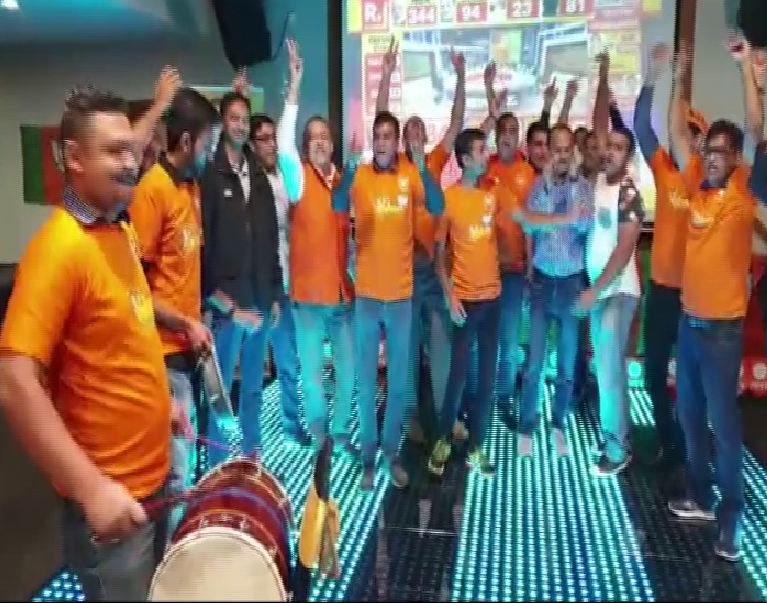 Supporters of PM Modi in Perth were seen celebrating his certain return to power. (Photo/ANI)