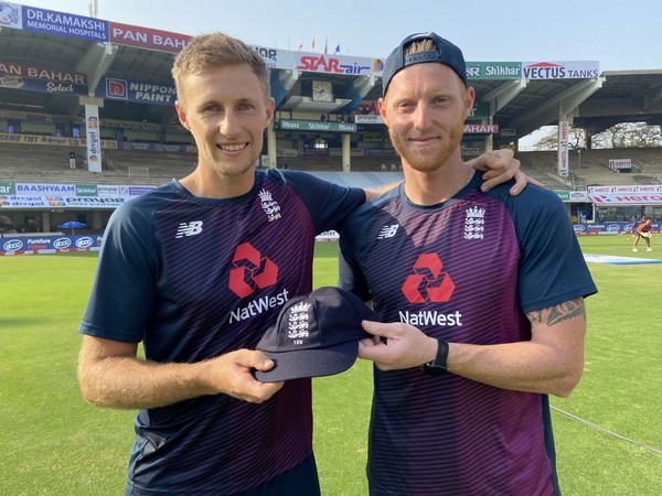 England skipper Joe Root receiving his 100th Test cap from Ben Stokes (Photo/ ECB)