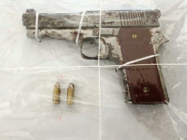 Country-made pistol and two live cartridges seized by Mumbai police.