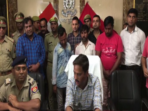 The Meerut police in Uttar Pradesh with four arrested on Sunday. Photo/ANI