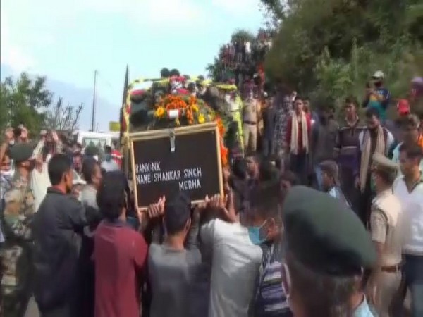 Visuals from last rites of late Naik Shankar Singh in his native village in Pithoragarh on Sunday. Photo/ANI