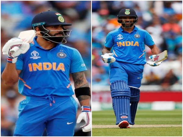 Indian skipper Virat Kohli (L) and opening batsman Shikhar Dhawan (R)