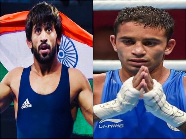 Bajrang Punia (L) and Amit Panghal (R)