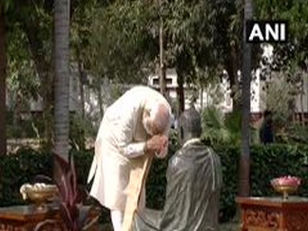 Prime Minister Narendra Modi paying tribute to Mahatma Gandhi on Friday.