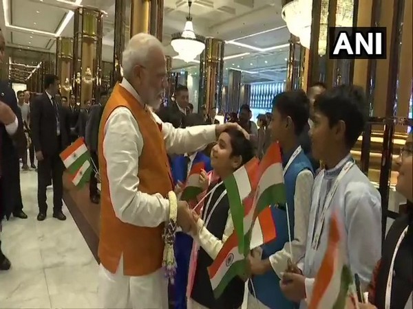 PM Modi was seen interacting with children gathered at the hotel Marriott Marquis in Bangkok on Saturday