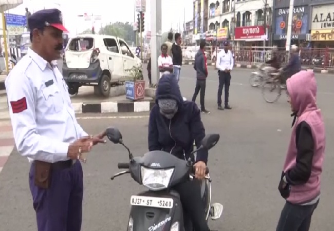 A visual of traffic police checking people in Bhopal, Madhya Pradesh on Thursday.