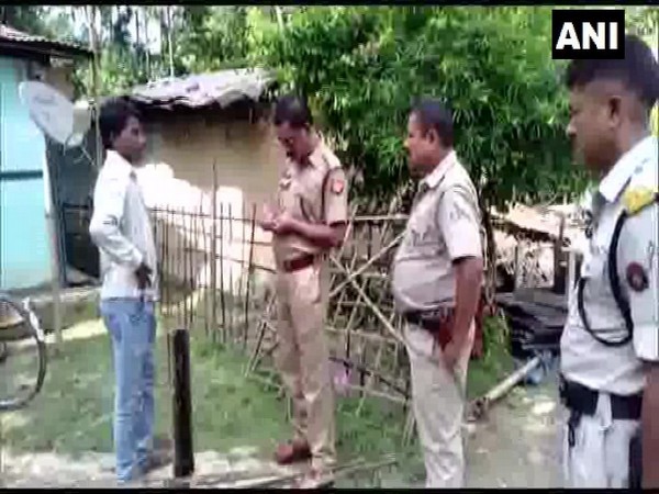 Police investigating the place where body of a woman was found in the toilet of her house, post which her husband and mother-in-law were beaten to death