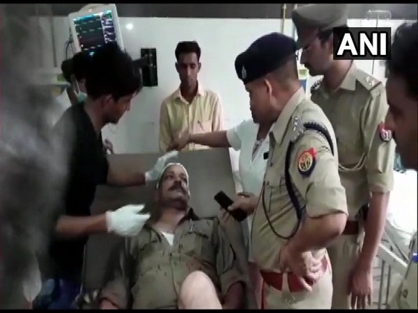 Police personnel were allegedly attacked by one of the two parties involved in a land dispute case when they were trying to mediate.