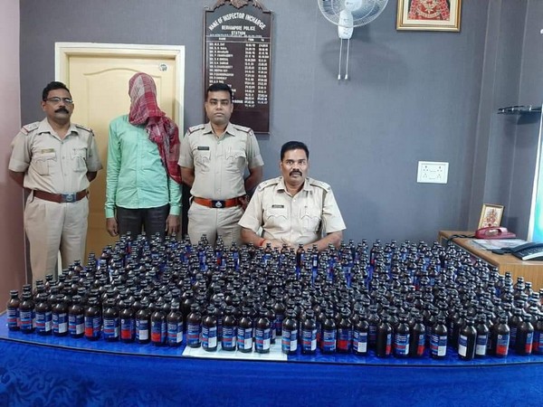 West Bengal police with the accused and seized bottles of Phensedyl. Photo Credit: West Bengal Police Twitter handle