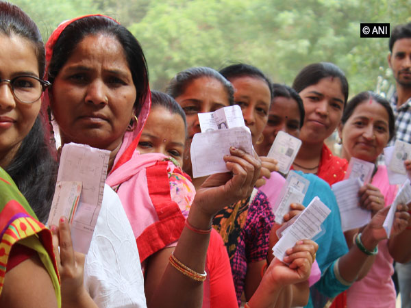 Voters waiting in queue to cast ballot.