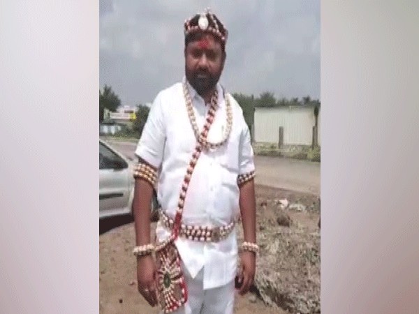BJP sitting MLA from Udgir, Sudhakar Bhalerao dressed as 'Potraj' in Latur in Maharashtra on Thursday. Photo/ANI
