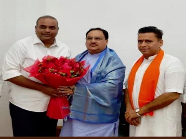 TDP Member of Legislate Council (MLC) Annam Satish Prabhakar (L) with BJP working president JP Nadda (centre). Photo/ANI