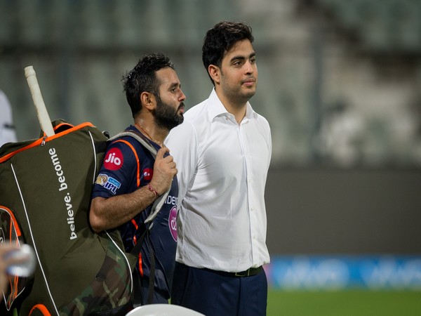 Wicket-keeper batsman Parthiv Patel with Mumbai Indians owner Akash Ambani