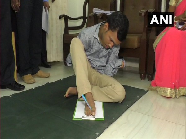 Pralay Dey, a differently-abled student who secured first division in class 10 board examination exam. 