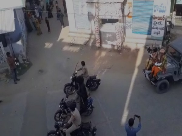 Police in Dhone town during COVID-19 awareness drive [Photo/ANI]