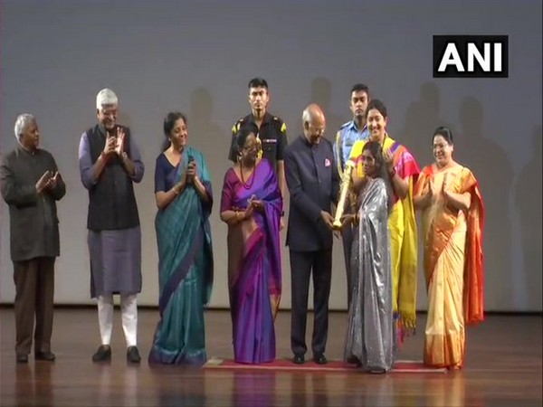 President Ram Nath Kovind presents 'Nari Shakti Puraskar' to Bina Devi on Sunday. Photo/ANI