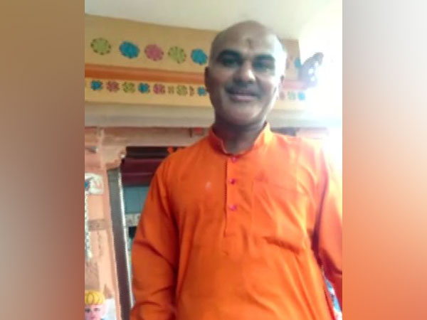 The priest who stopped a Dalit man has been taken into custody. 