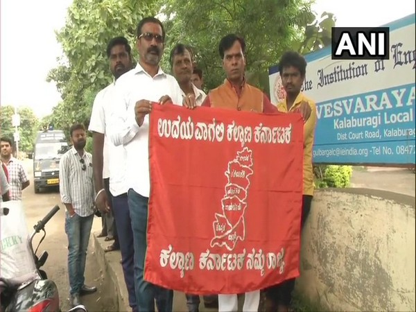 Kalyana Karnataka workers protest near Sardar Vallabha Bhai Patel circle in Kalaburagi on Friday. Photo/ANI