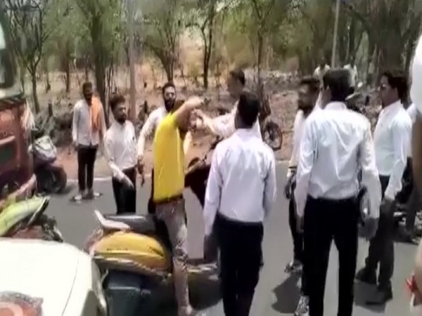 Visual of lawyers beating up the passersbys (Photo/ANI) 