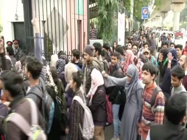 Students of Jamia Milia Islamia protest against CAA on Saturday in New Delhi [Photo/ANI]