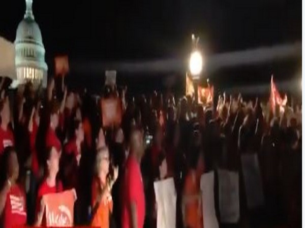 Protestors gather outside White House on Sunday following mass shooting incident at El Paso