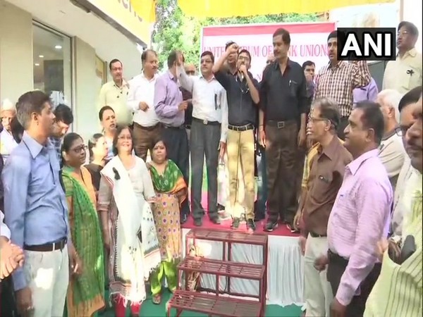 Members of United Forum of Bank Unions staged protest against the bank merger, in Ahmedabad, Gujarat on Saturay.