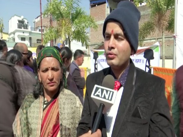 Martyr Mohanlal Raturi's wife Savita Devi with her son-in-law Sarvesh Nautiyal. 