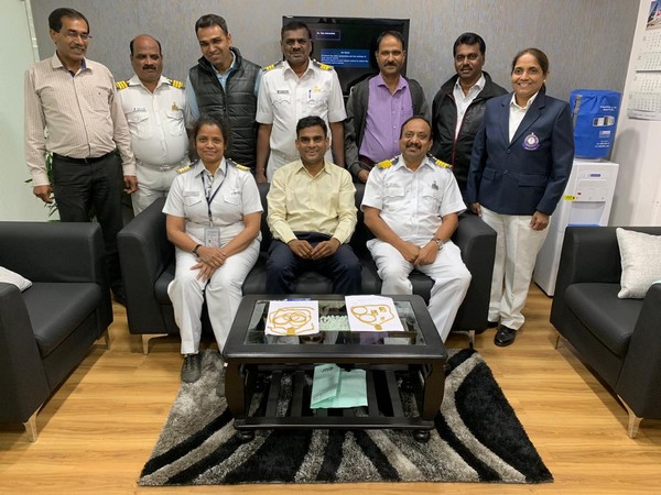 Customs officials with the seized gold on Sunday