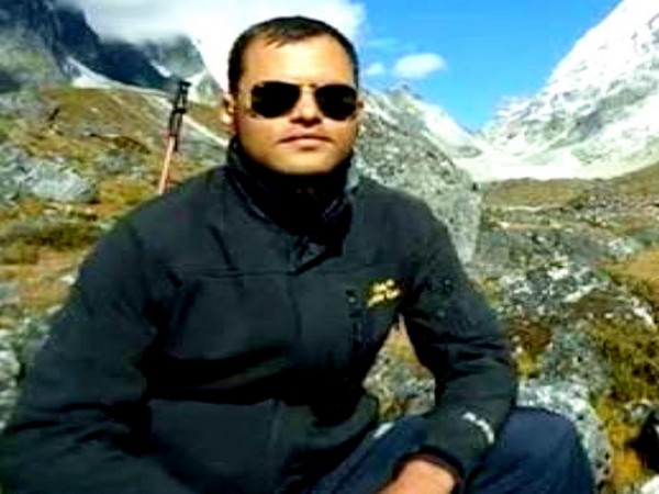 Yamuna Prasad Paneru (Image source: Twitter/Trivendra Singh Rawat)