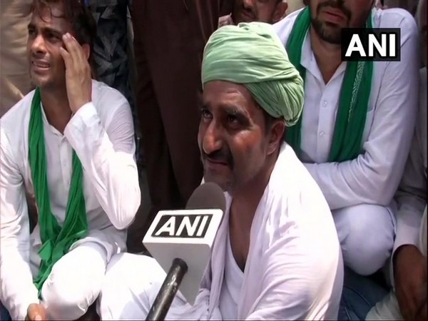 Puran Singh, President, Bhartiya Kisan Sangathan  talking to ANI at Delhi-Noida border at Ghazipur on Saturday 