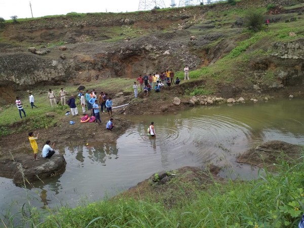 Police and the locals at the quarry in Hatunia village on Thursday. Photo/ANI