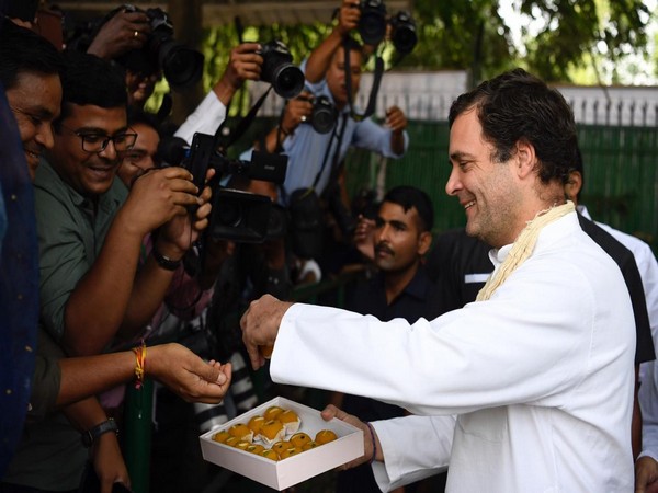 Congress President Rahul Gandhi distributed sweets to journalists at AICC headquarters on his 49th birthday.