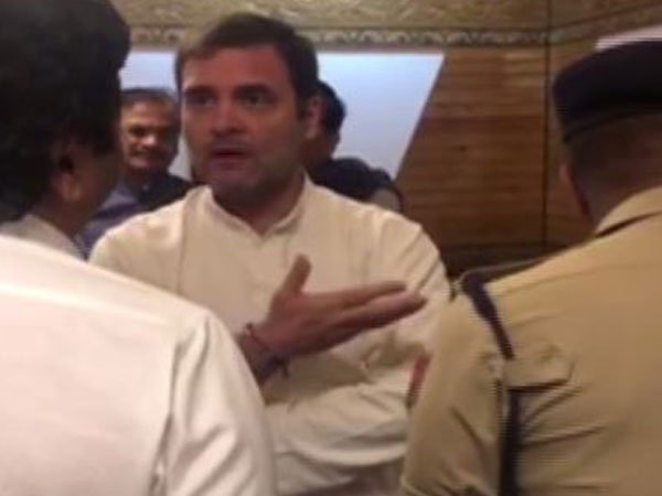 Rahul Gandhi talking to officials at Srinagar Airport on Saturday 