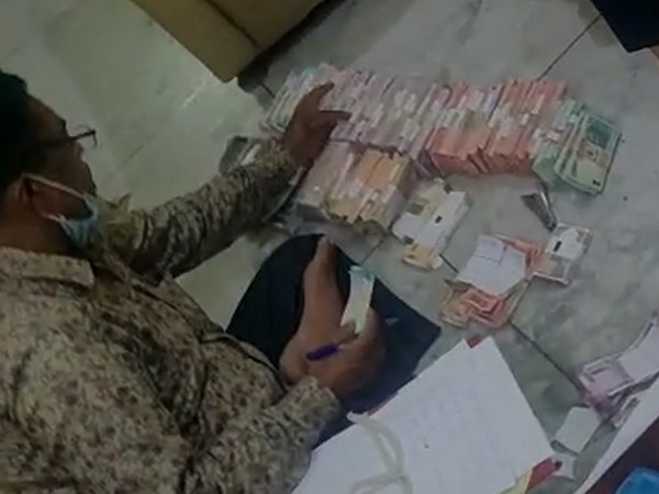 Lokayakuta officer during the raid on a property of Pradeep Khanna. (Photo/ANI)