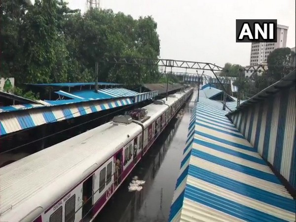 Railway tracks submerge at Sion railway station, after heavy rains in the area.