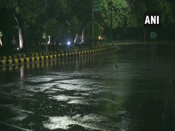 Janpath area receiving rainfall. Photo/ANI