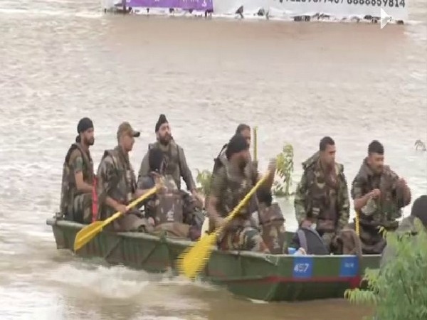 Army personnel in Kolhapur city on Friday. (Photo/ANI)