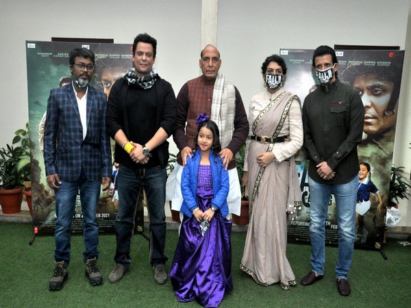 Defence Minister Rajnath Singh with the team of 'Fauji Calling' in New Delhi on Monday. 