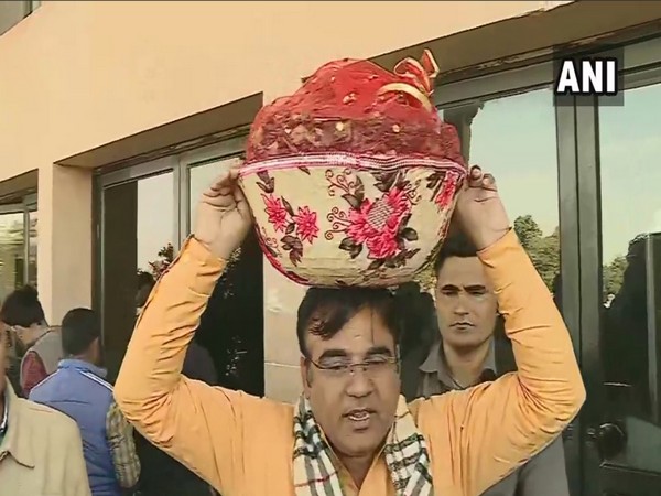 BJP MLA Bihari Lal Nokha arrives with basket of locusts in Rajasthan Assembly. Photo/ANI