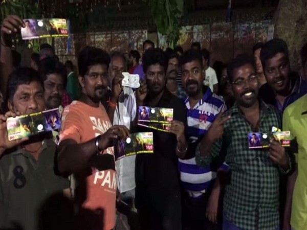 Fans outside movie theatre in Madurai (Photo/ANI)