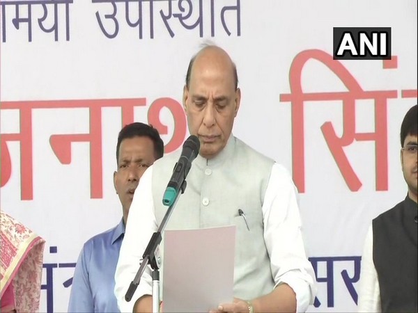 Defence Minister Rajnath Singh administering oath to people at Delhi Cantonment.on Wednesday. (Photo/ANI)