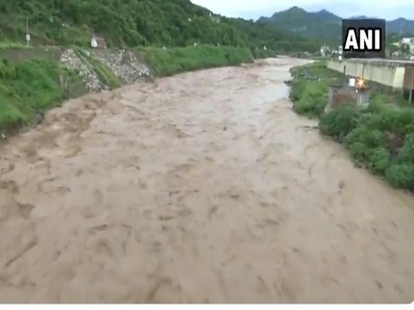 An earlier visual of a river overflowing following heavy rainfall in Rajouri, Jammu and Kashmir. 