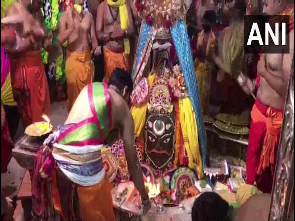 Devotees and priests offered prayers at the Mahakaleshwar Temple in Ujjain on Monday. (Photo/ANI)