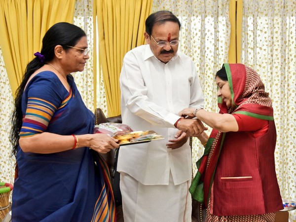 Old picture of Sushma Swaraj tying a rakhi to M. Venkaiah Naidu. (Photo/ M. Venkaiah Naidu Twitter)