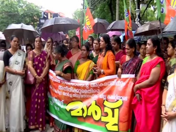 Visuals of BJP Mahila Morcha staging a protest march at the Secretariat on Friday in Thiruvananthapuram. Photo/ANI