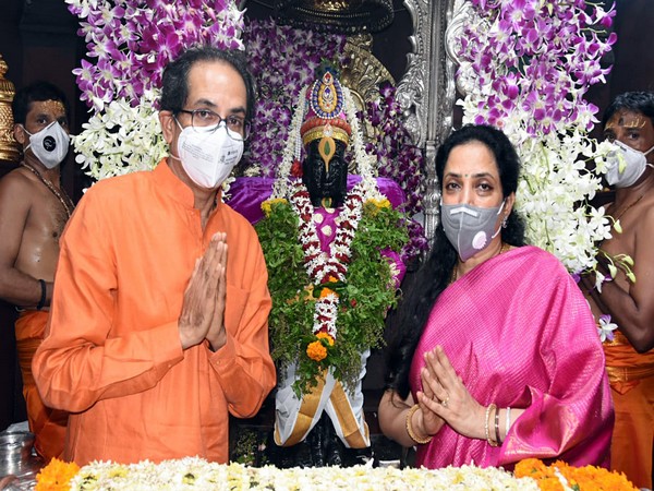 Chief Minister Uddhav Thackeray with his wife Rashmi Lord Vitthal temple in Pandharpur. Photo/ANI