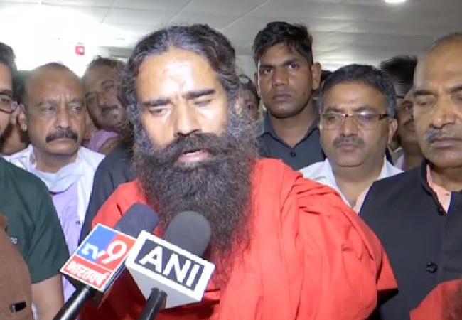 Yoga Guru Baba Ramdev speaking to media at AIIMS, Rishikesh in Uttarakhand on Friday.